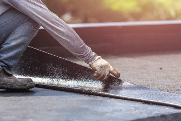 Professional Basement Waterproofing technician working in Bryan, OH